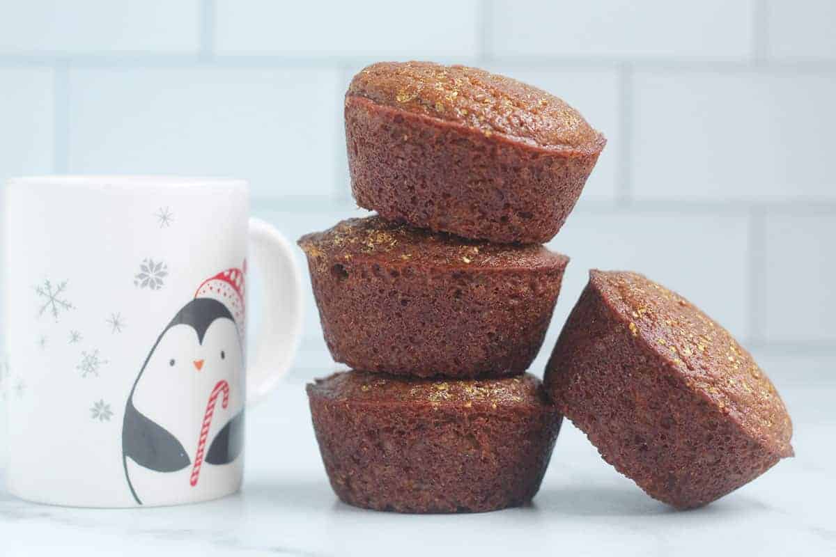 stack of gingerbread muffins with kids mug