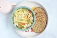 chicken soup for kids in teal bowl