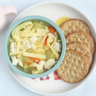 chicken soup for kids in teal bowl