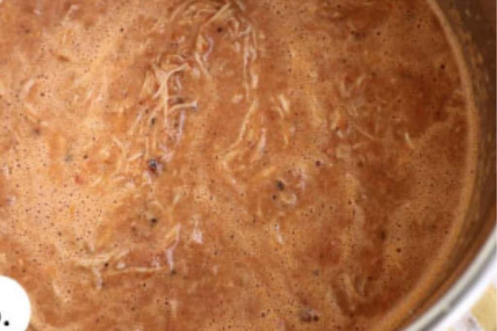 Butter chicken in sauce in instant pot.