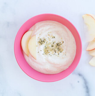 Applesauce-yogurt-in-pink-bowl-with-slices