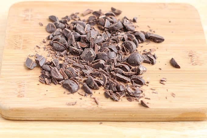 Chopped chocolate for chocolate chip cookie cake. 