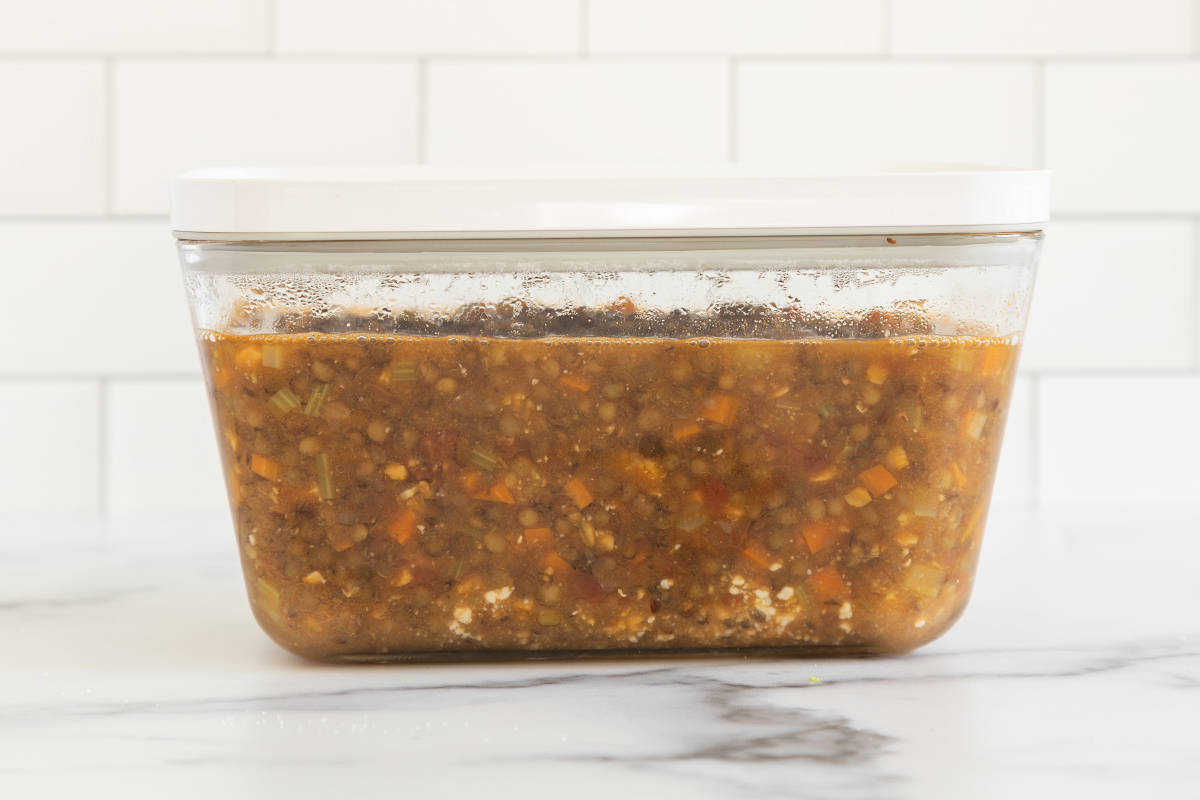 Lentil soup in storage container.