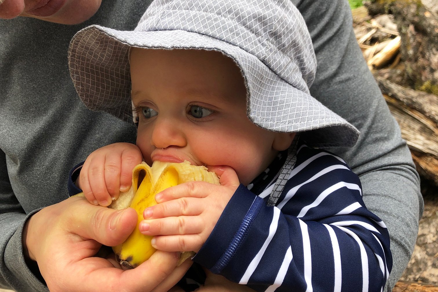 baby eating banana