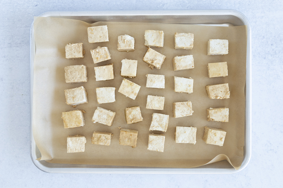 tofu cubes on parchment paper
