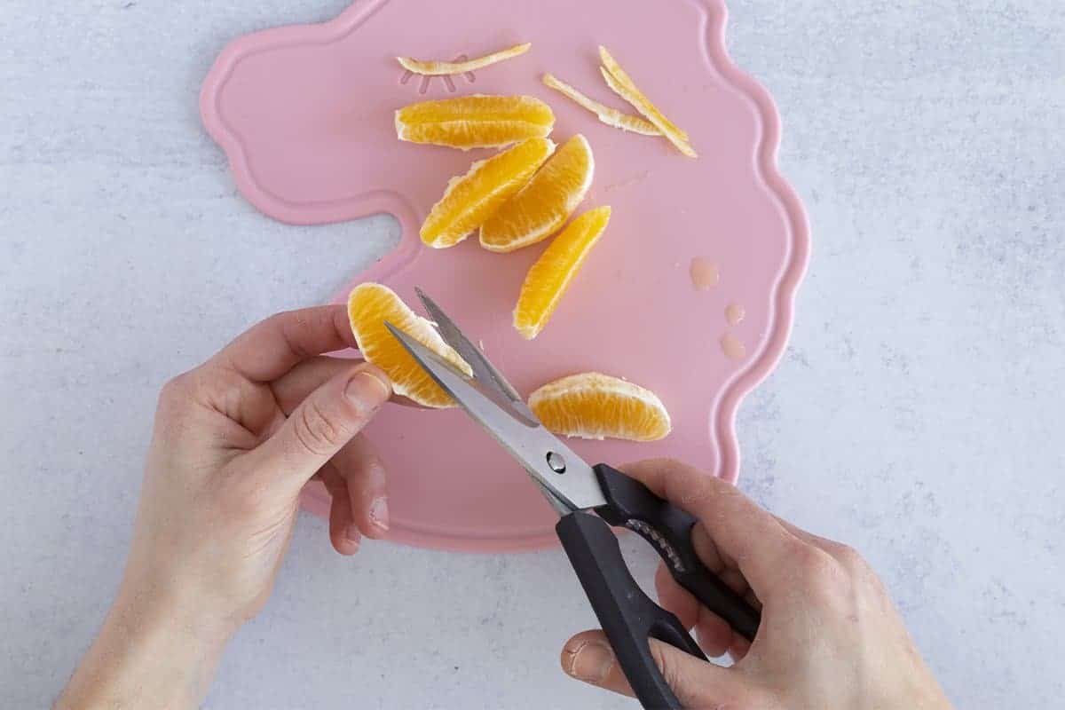 cutting membrane off of oranges for baby