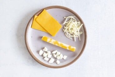 cheeses for baby on purple plate
