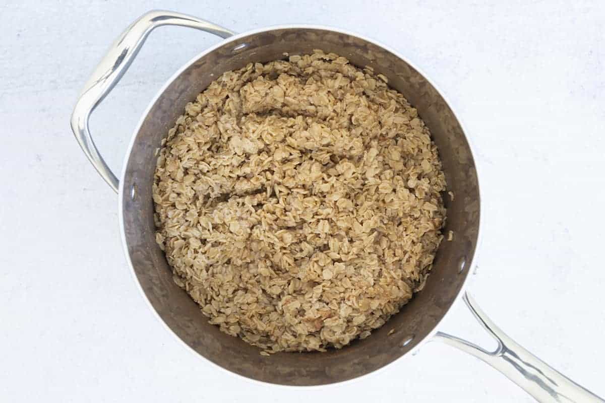 Softened oats in a cooking pot.