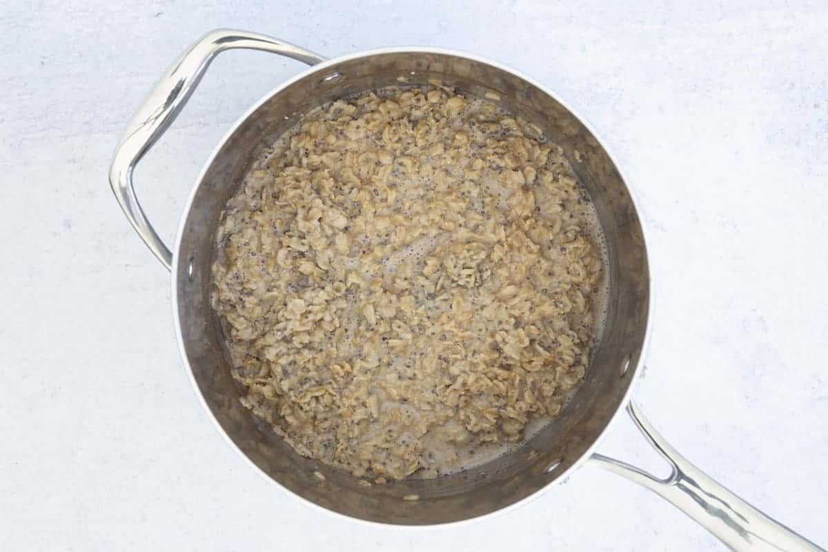 Milk and chia seeds added to cooked oatmeal.