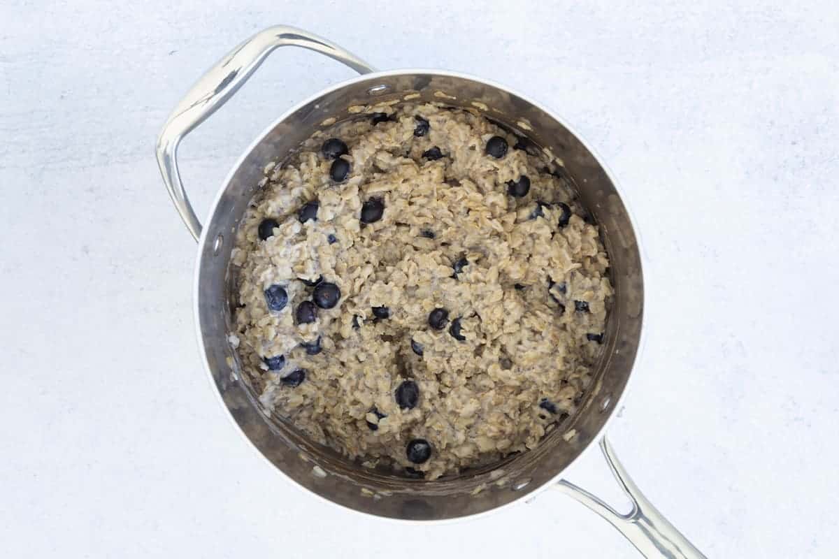 Blueberries mixed into chia seed oatmeal.