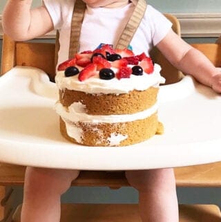 first-birthday-smash-cake-on-high-chair