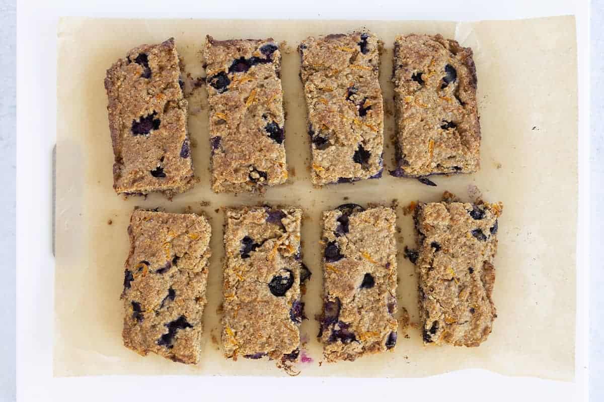 sliced oatmeal bars on parchment paper