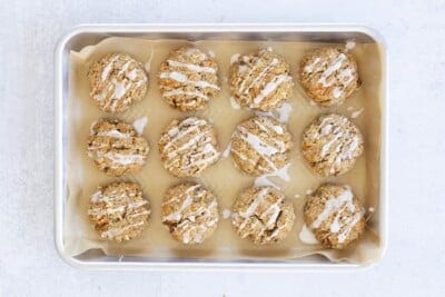 healthy oatmeal cookies with apples and carrots on tray