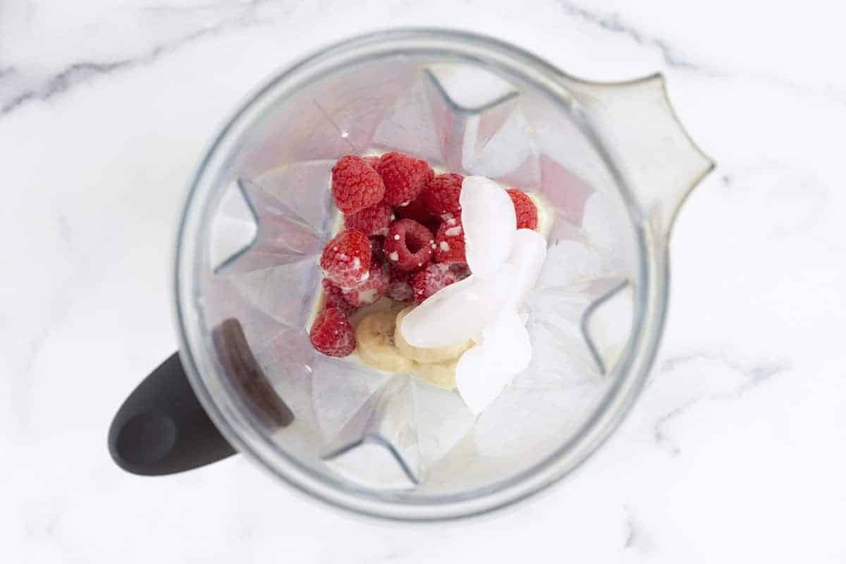 raspberry smoothie ingredients in blender