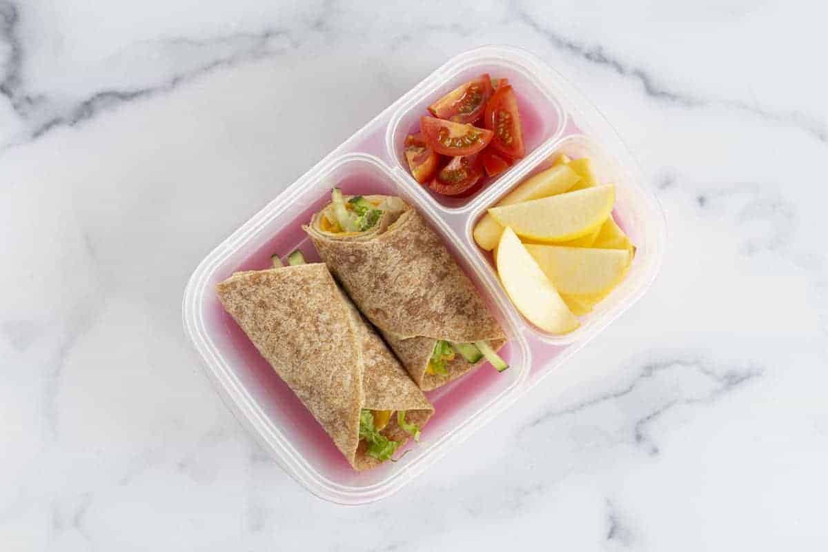 Hummus wrap in container a vegetarian lunch idea