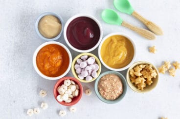 organic baby food in bowls on counter