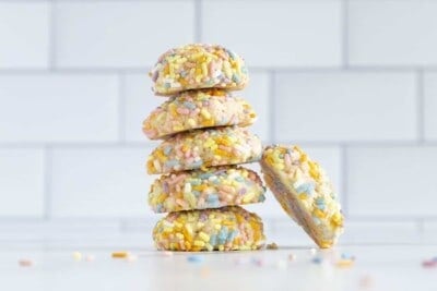 stack of sprinkle cookies on counter