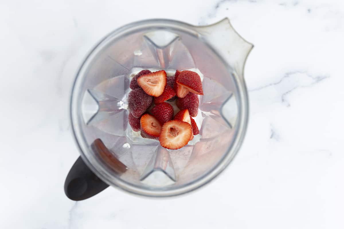 strawberry smoothie ingredients in blender
