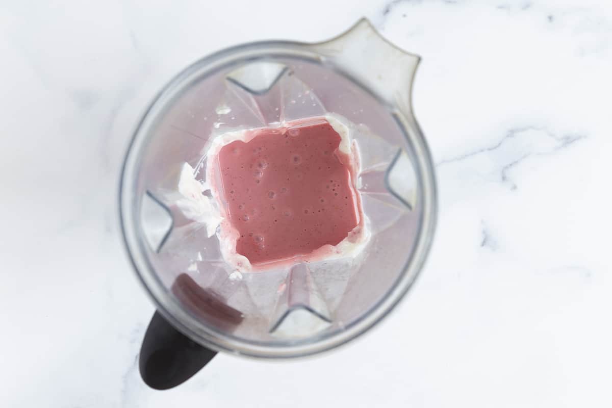 blended strawberry smoothie in blender