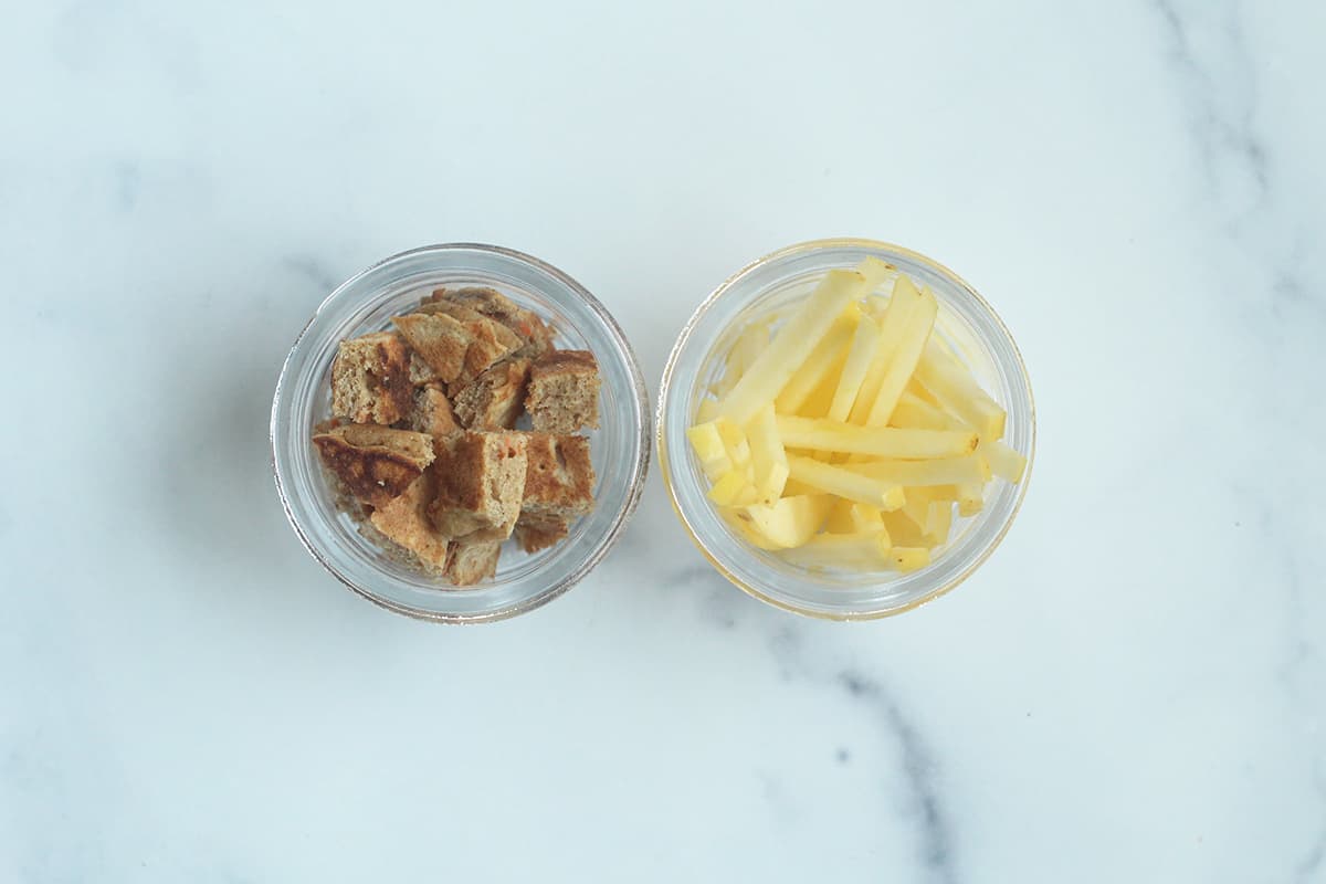 diced pancakes and apples sticks in containers