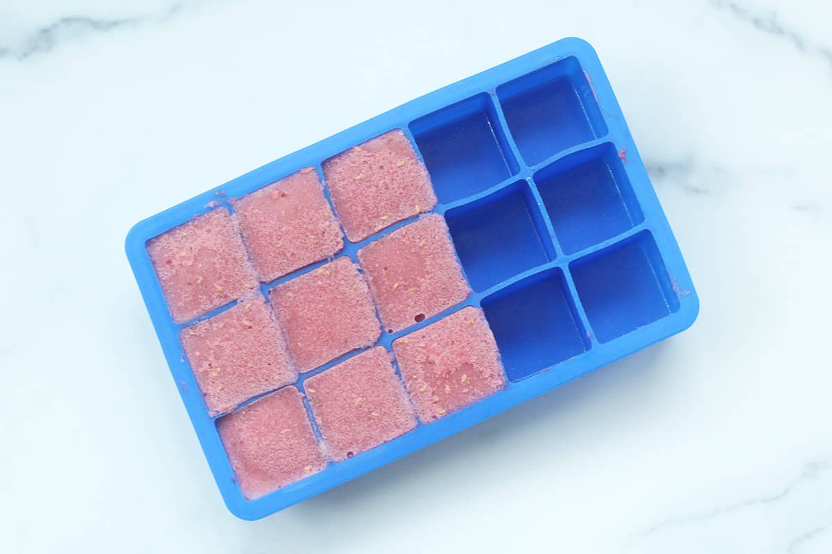 frozen cubes of smoothie in ice cube trays