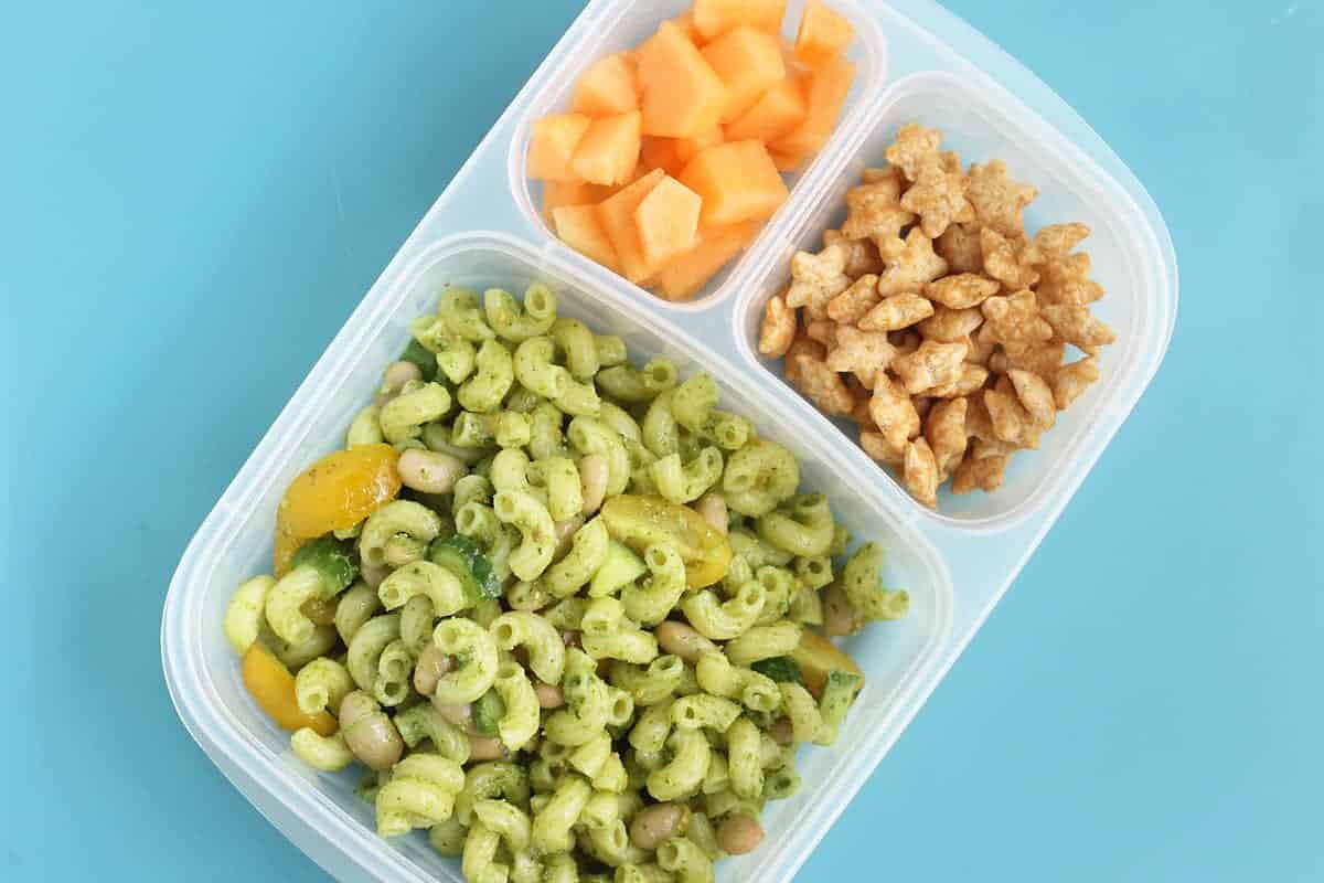 Pesto pasta salad in container for a vegetarian lunch idea