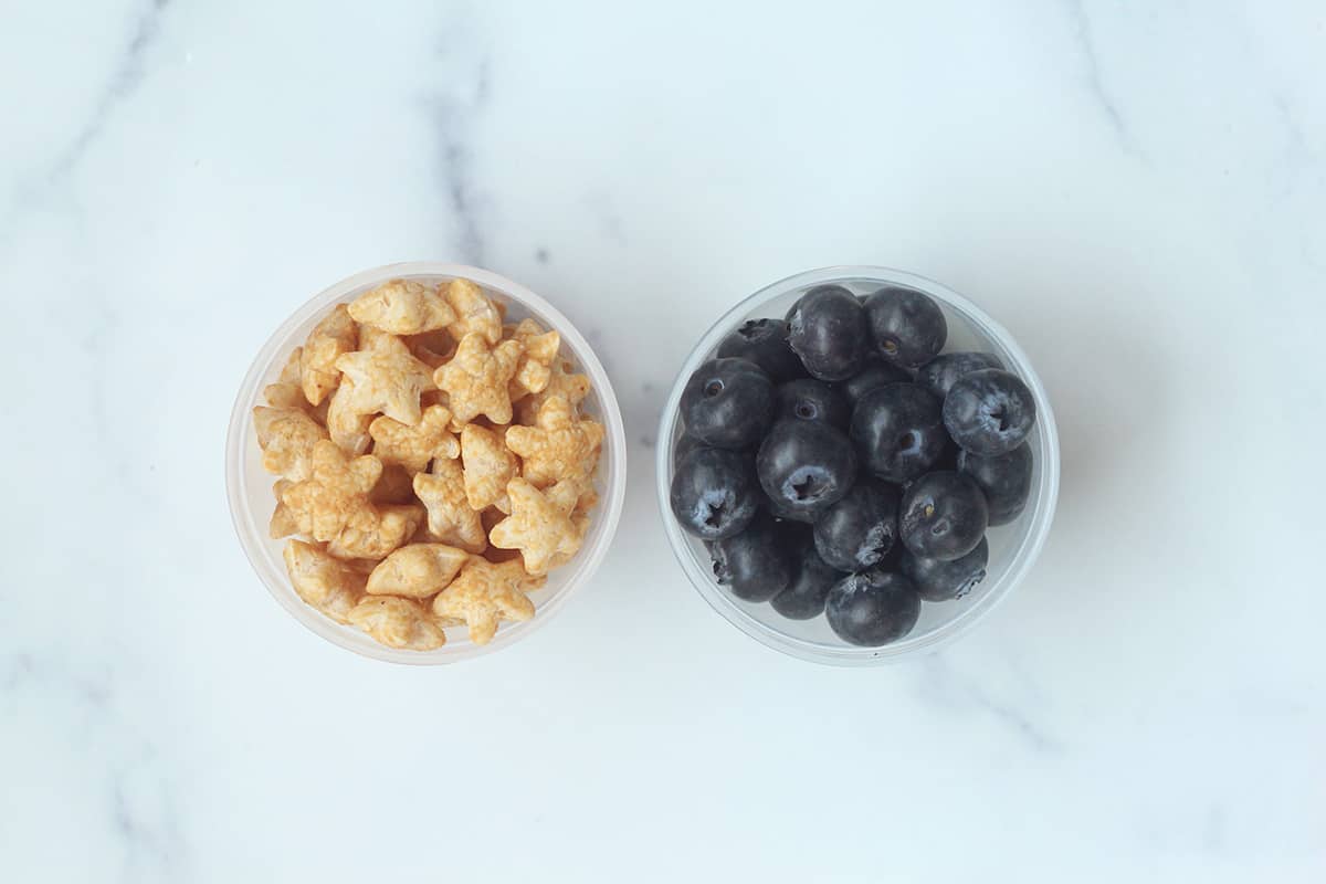 puffs and blueberries in containers