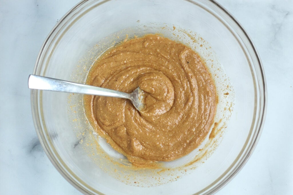 wet ingredients for cereal bars in bowl.