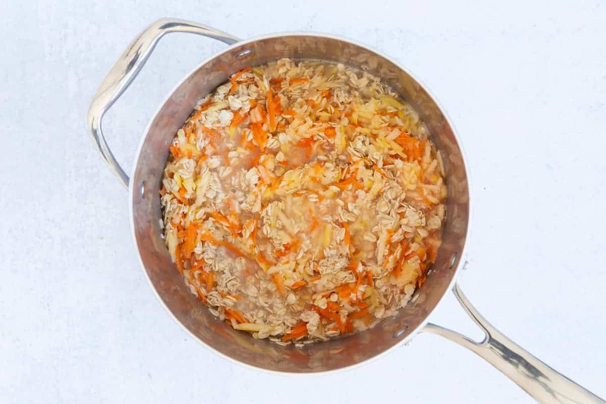 stirred-together-carrot-cake-oatmeal-ingredients-in-pot-step 2