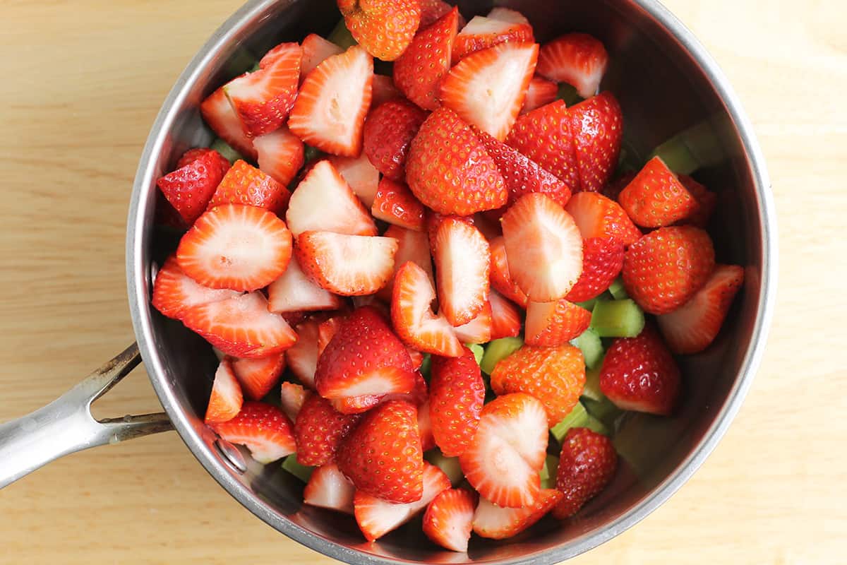 strawberries and rhubarb in saucepan