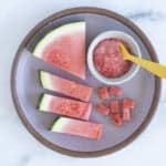 Watermelon for baby in various forms on grey plate