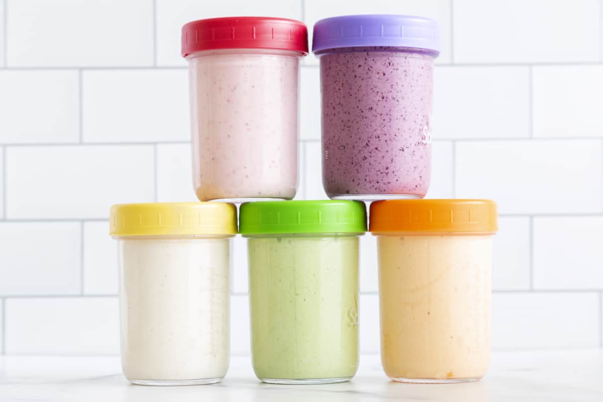 Yogurt drinks for toddlers in various flavors stacked in 5 containers 