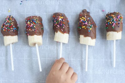 chocolate-covered-bananas-on-parchment-paper-1