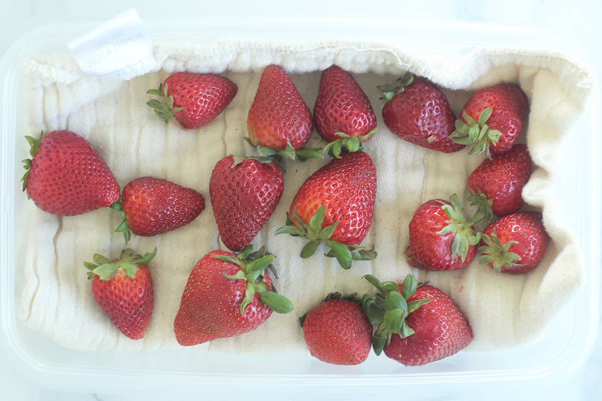 strawberries in lined container.