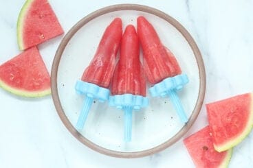 watermelon popsicles on plate