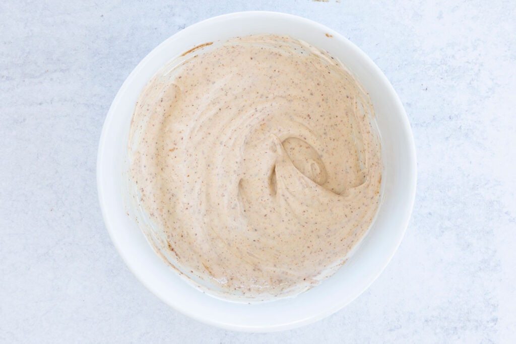 stirred together yogurt dip in white bowl.