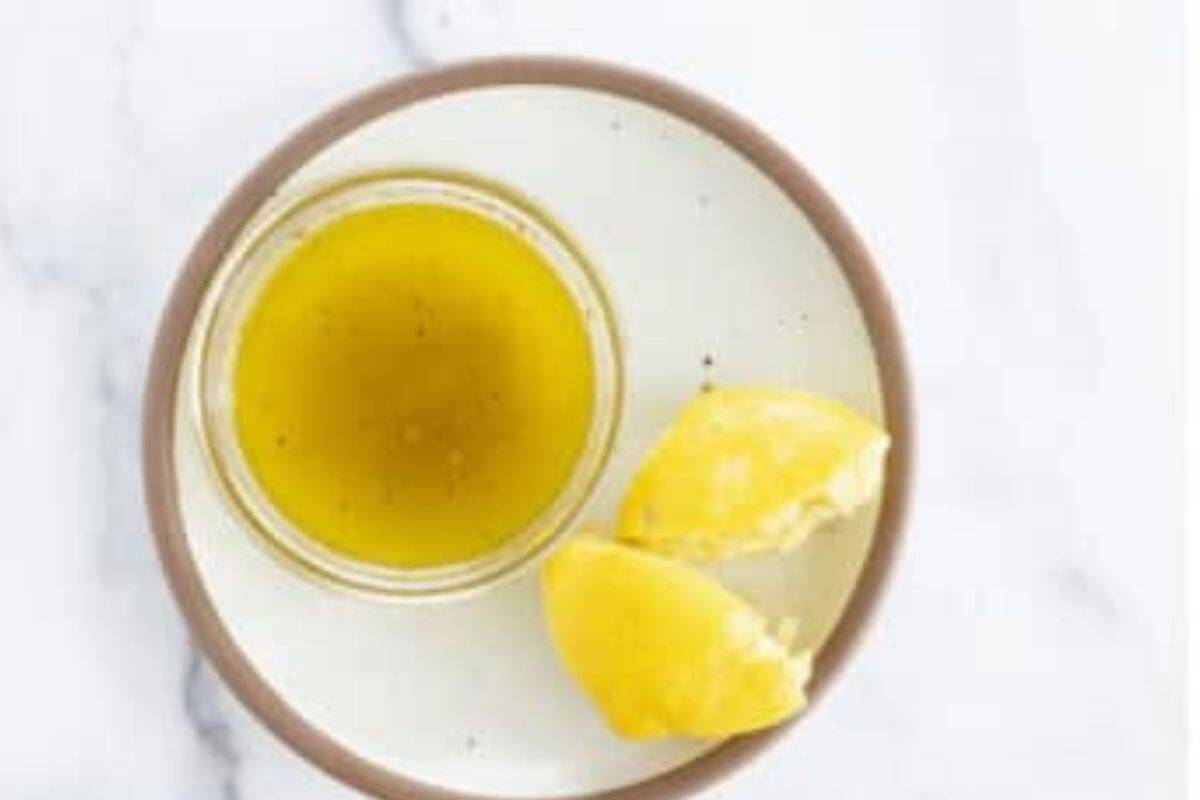 Olive oil and lemon on plate for quinoa salad. 