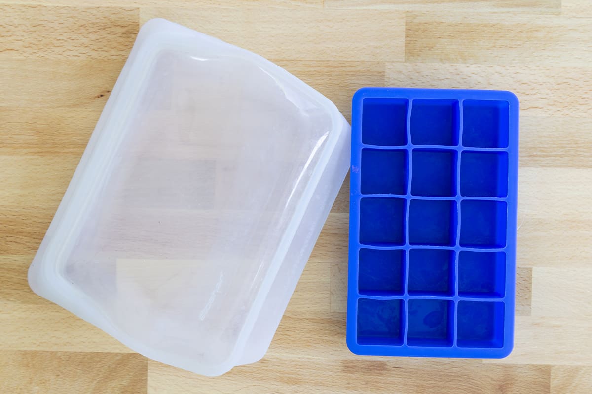 ice cube tray and reusable storage bag on countertop.