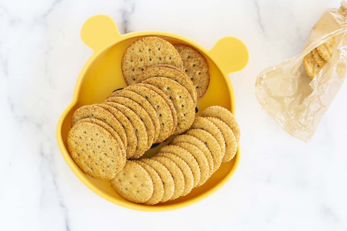 round crackers in yellow bear plate