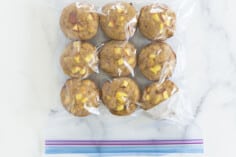peach muffins in freezer bag on countertop