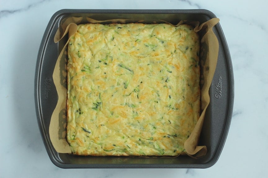 zucchini slice in baking pan after baking