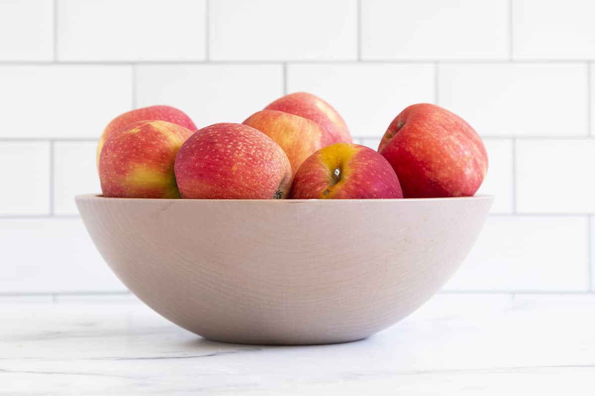 Apples in grey bowl for how to store apples