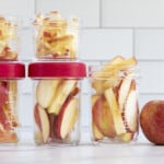 apple slices in stacked glass jars for how to store apples