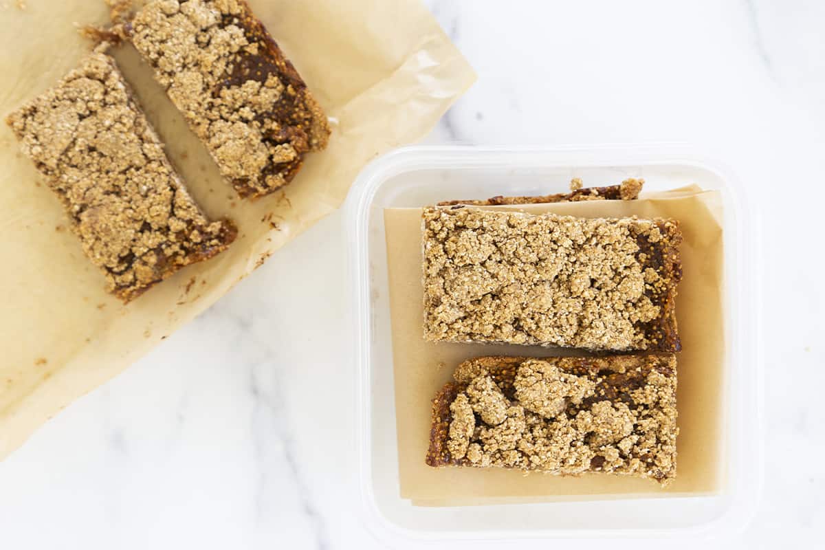 fig bars cut and placed in plastic container