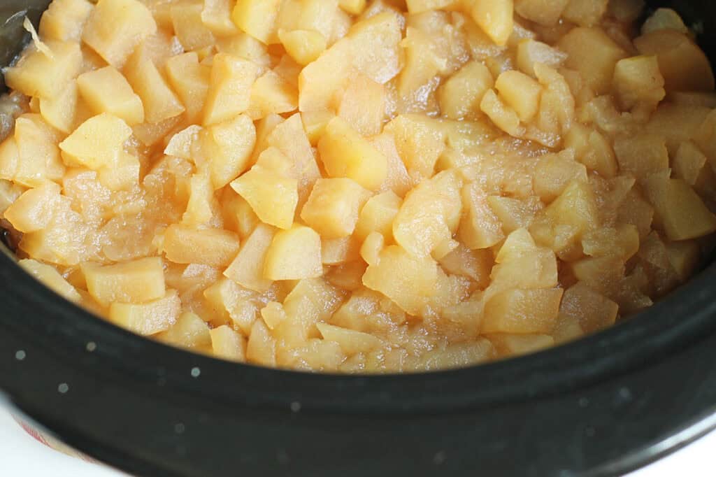 cooked apples in crockpot.