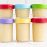 homemade applesauce in containers on counter.