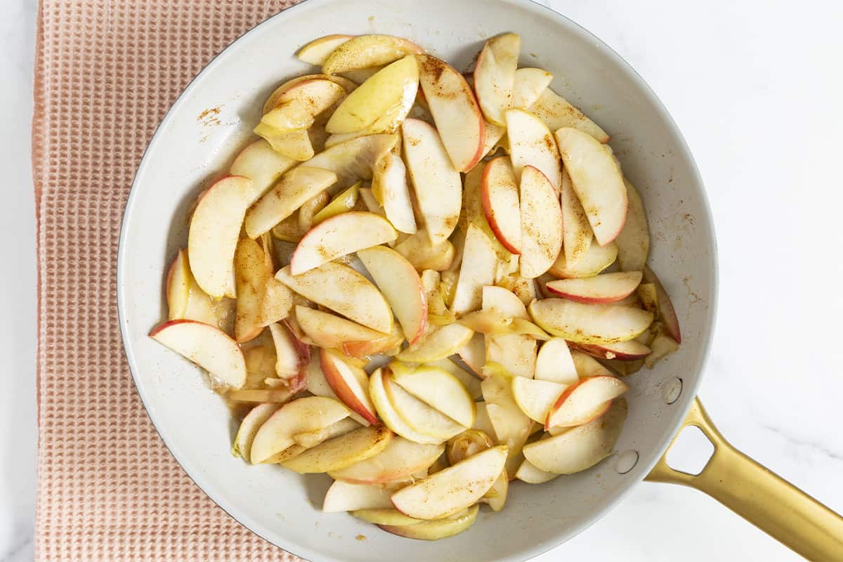 Cinnamon apples in pan after cooking.