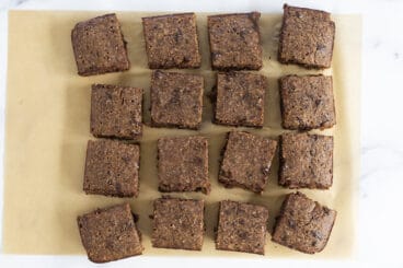 sliced brownies on parchment paper.