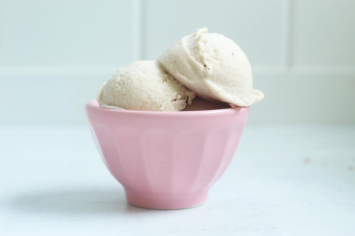 banana ice cream in pink bowl.