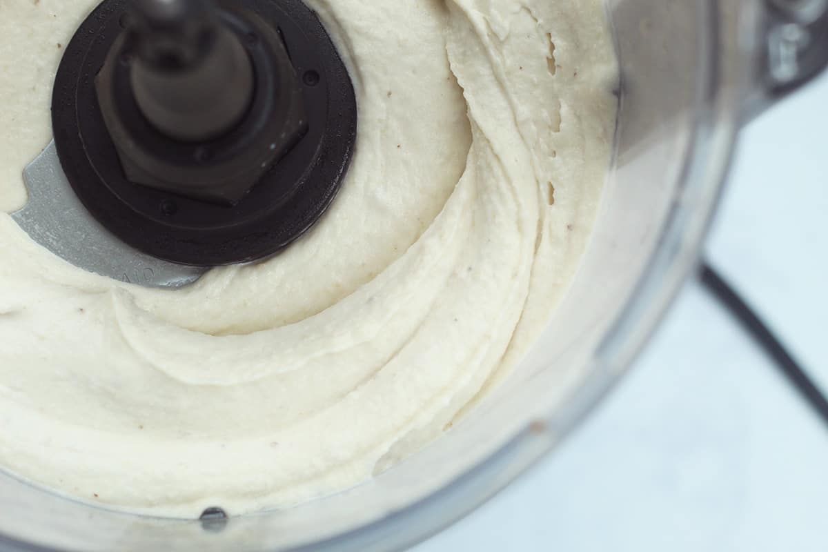 close up of banana ice cream in food processor.
